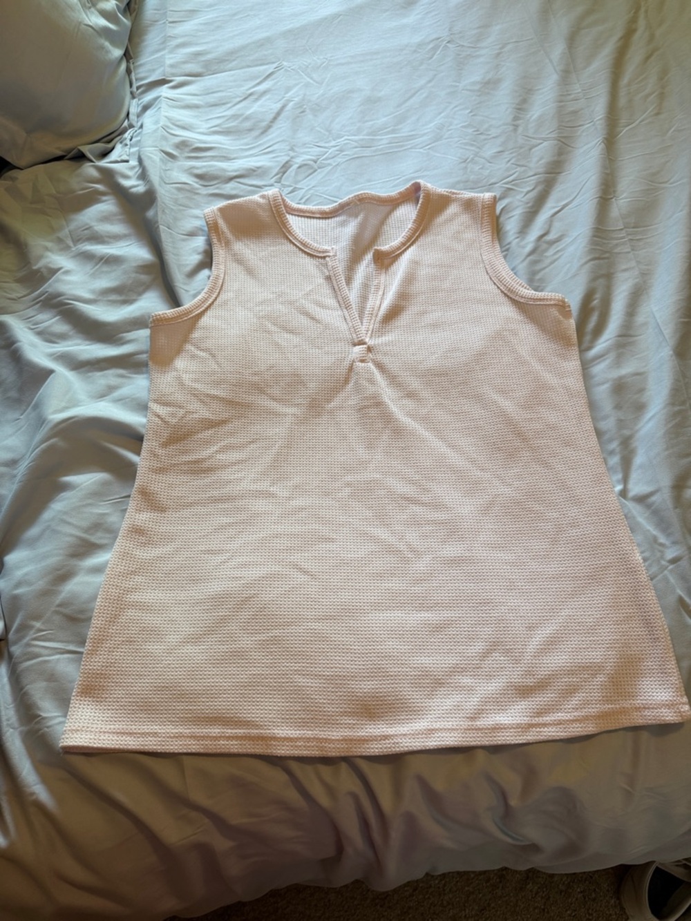 Sleeveless Knit Tank Top in Light Pink.